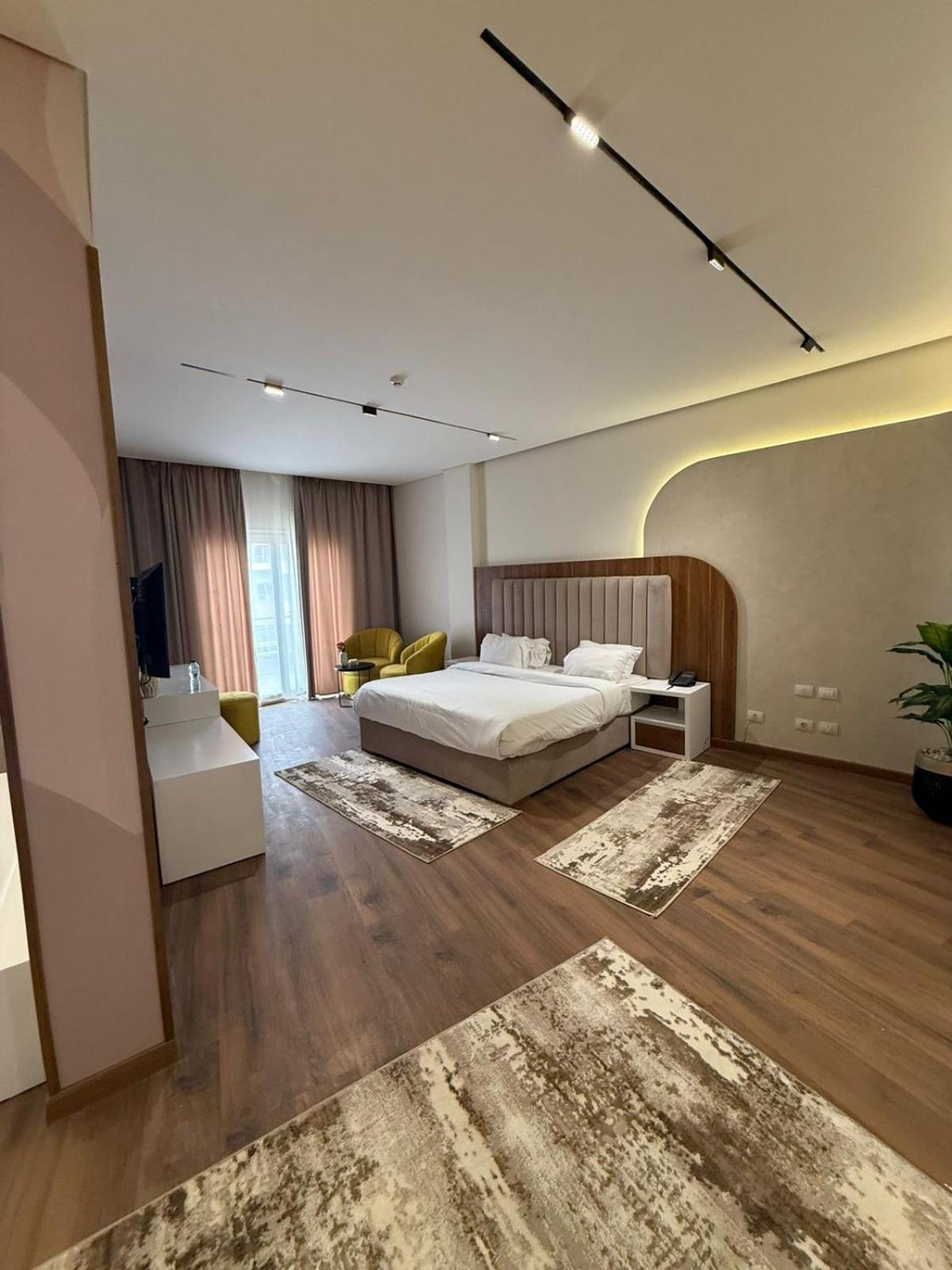 Tolip Family Park Hotel Cairo Exterior photo A bedroom at the hotel